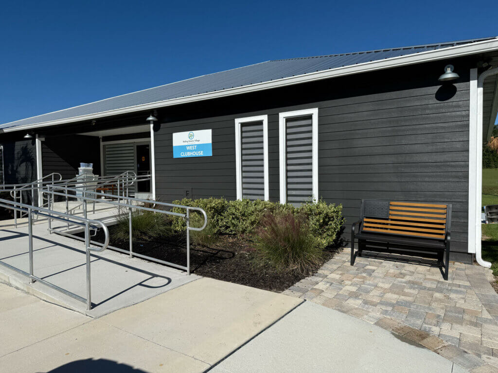 Exterior view of the renovated West Clubhouse at Rolling Greens Village in Ocala, Florida.
