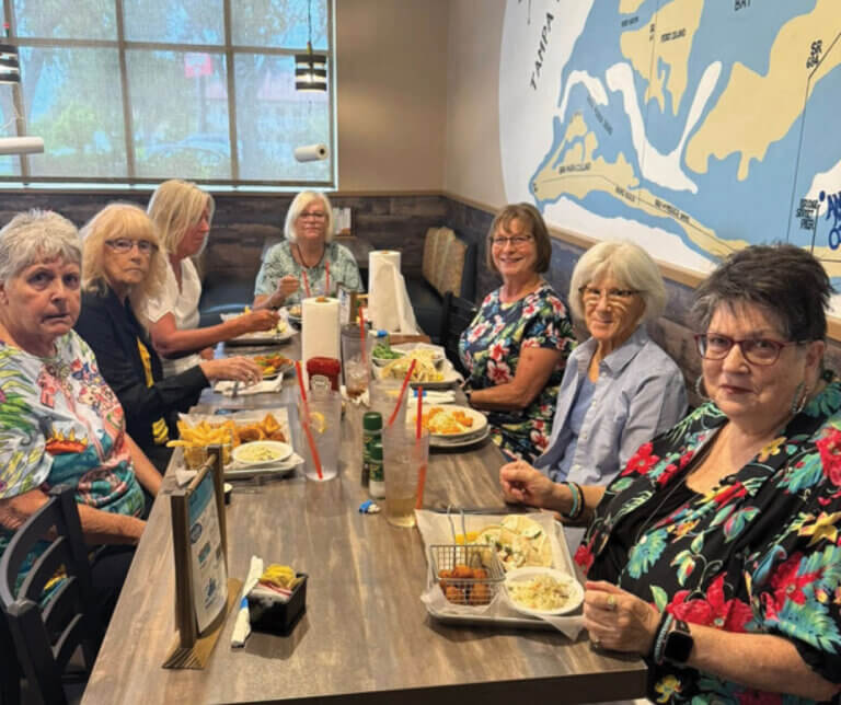 Women from River Vista RV Park eating lunch at a restaurant in Florida.