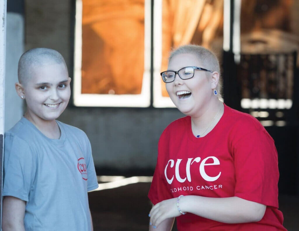 Kylie Shiell (R) standing with a friend during her leukemia battle in Savannah, Georgia.