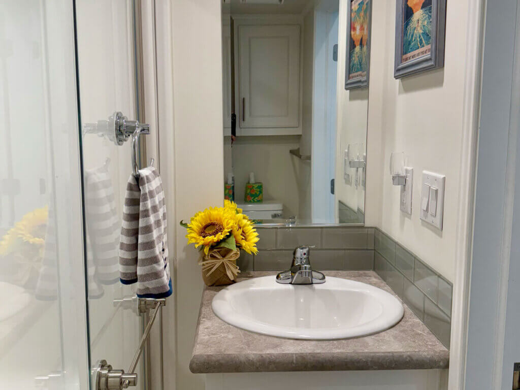 Bathroom inside of cabin 00754 at Point Sebago Resort on Sebago Lake in Casco, Maine.