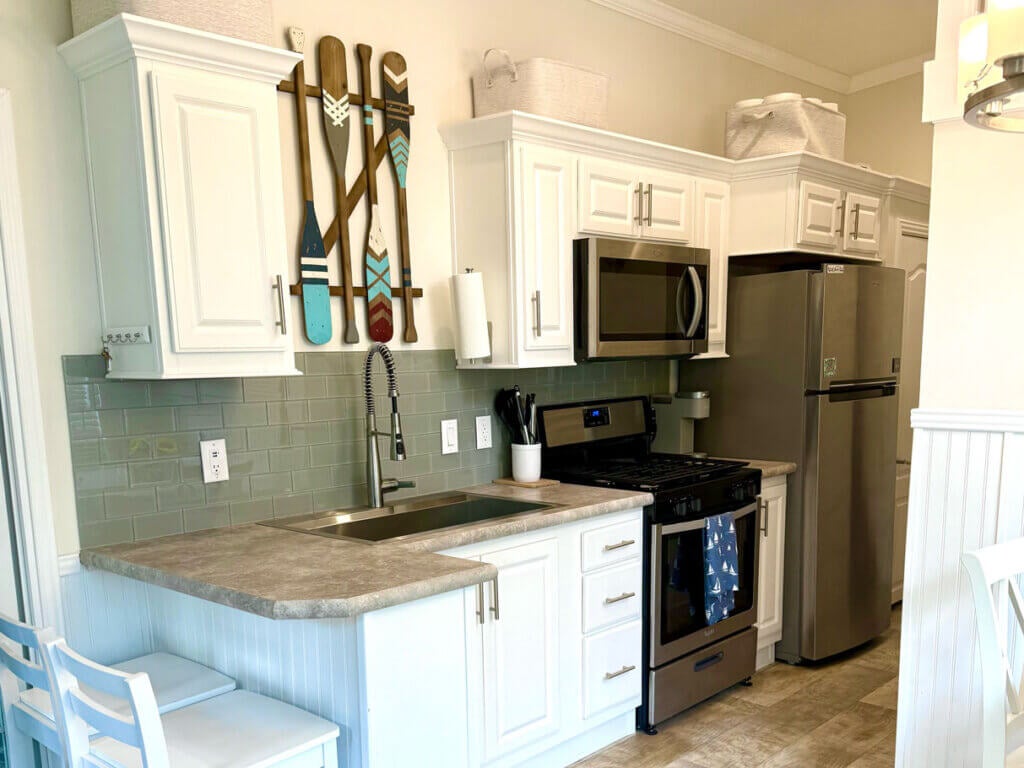 Kitchen inside of cabin 00754 at Point Sebago Resort on Sebago Lake in Casco, Maine.