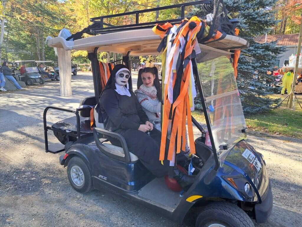 Decorated golf cart at the Halloween Parade in Point Sebago in Maine.