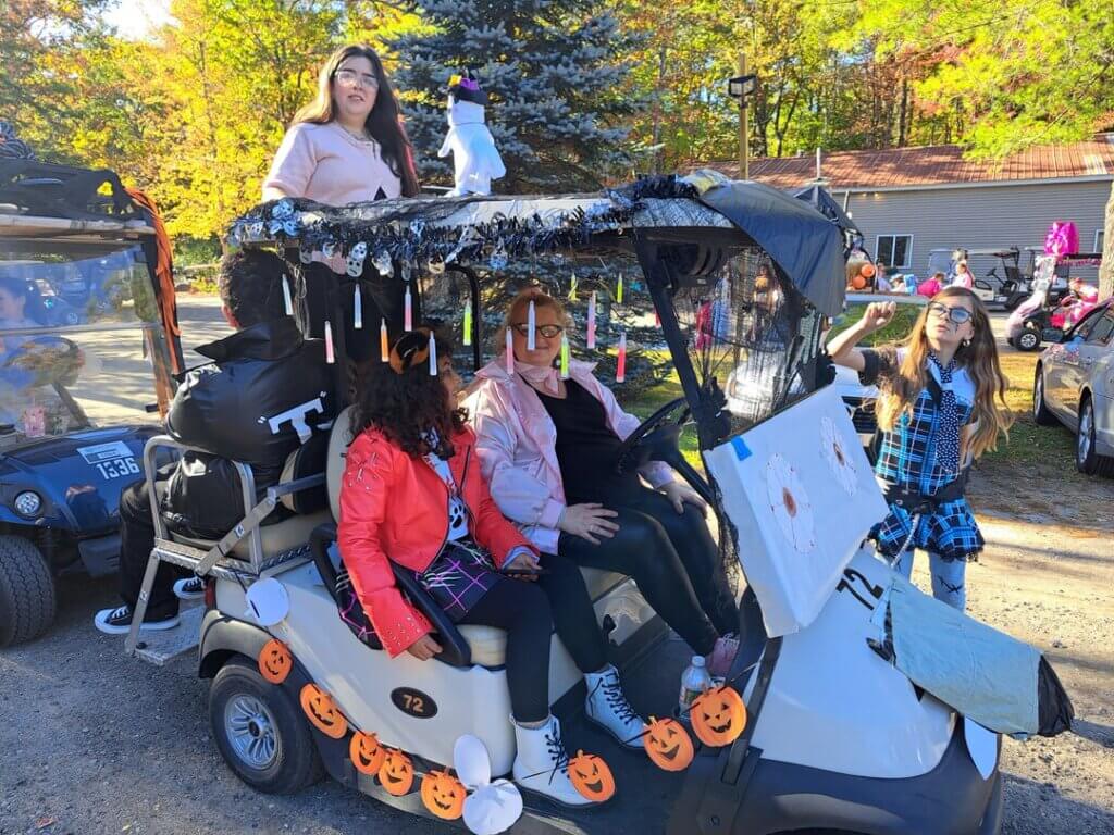 Decorated golf cart at the Halloween Parade in Point Sebago in Maine.