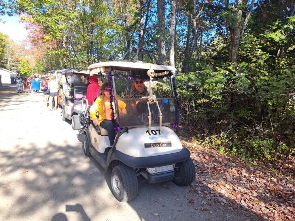 Golf cart decorated for the 2025 Halloween Parade at Point Sebago Resort in Casco, Maine.