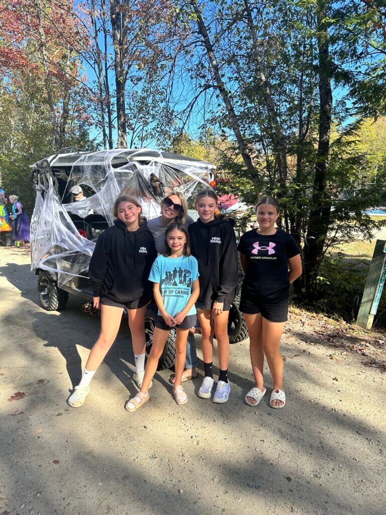 Guests posing before the Halloween Parade at Point Sebago Resort in Maine.