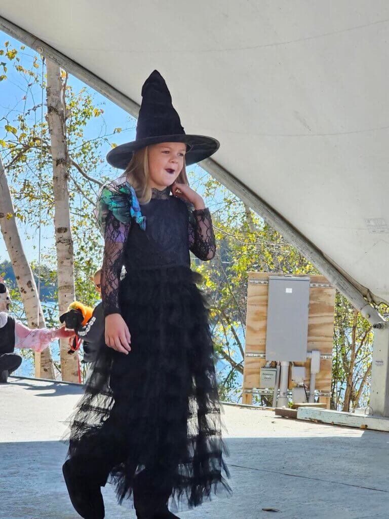 A little girl dressed as a witch in the Halloween Costume Contest at Point Sebago Resort in Casco, Maine.