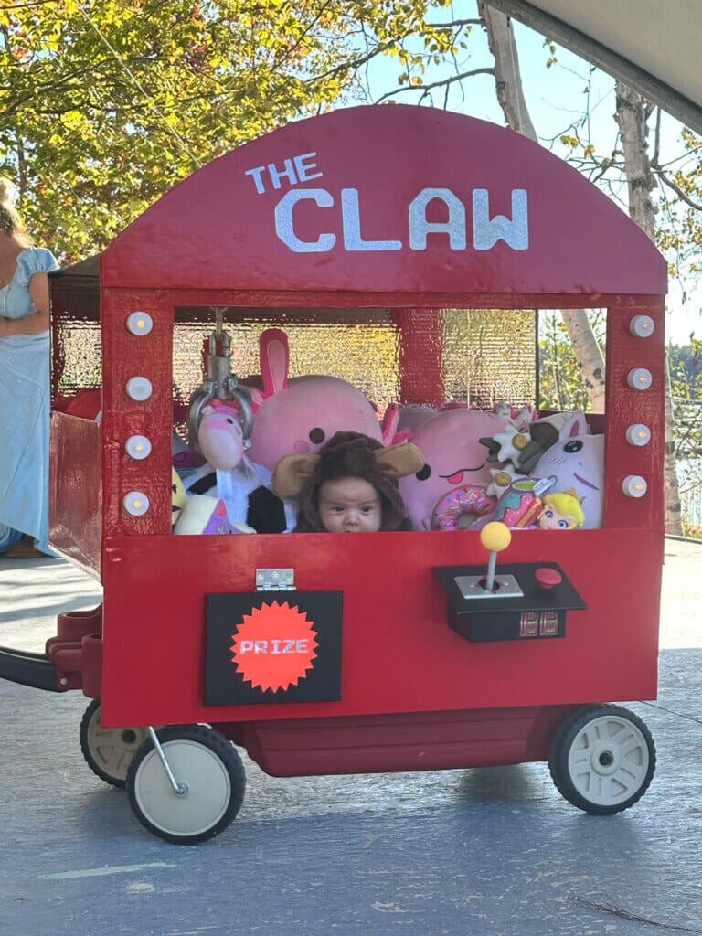 A baby dressed as a claw machine prize in the Halloween Costume Contest at Point Sebago Resort in Casco, Maine.