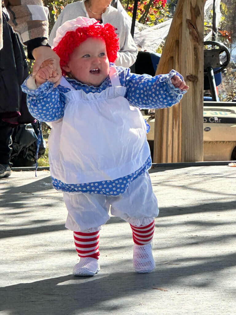 Toddler dressed as Raggedy Ann at Point Sebago Resort in Casco, Maine.
