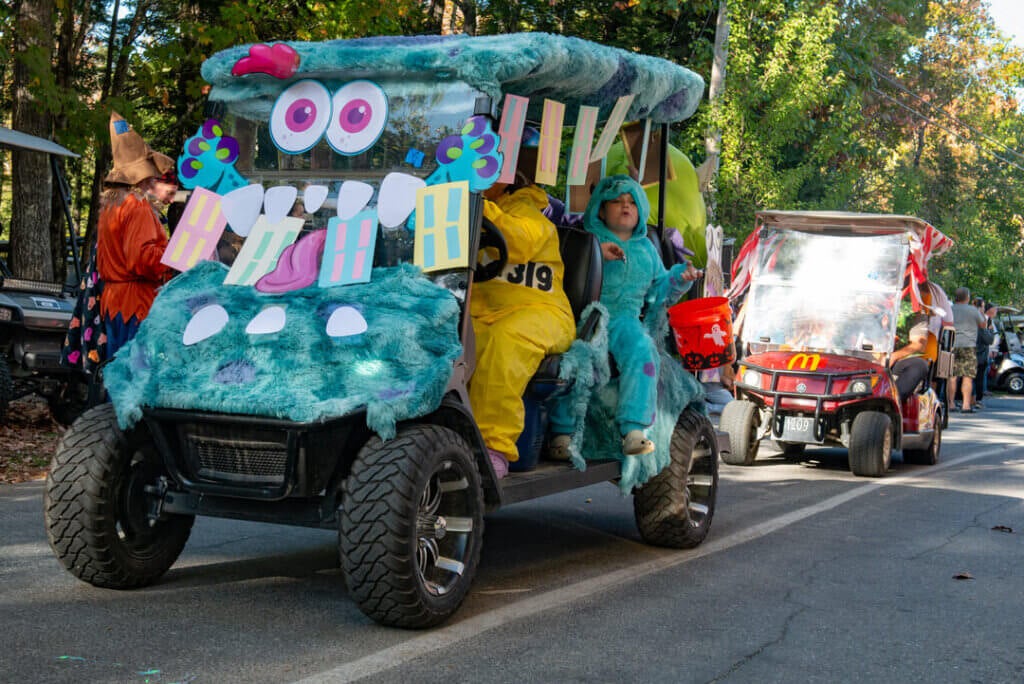 A Monsters Inc themed golf cart in the Halloween Parade at Point Sebago Resort in Maine. Photo courtesy of Dave Rando Photography.