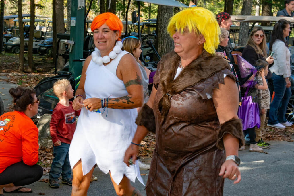 Guests dressed as the Flintstones in the Halloween Parade at Point Sebago Resort in Maine. Photo courtesy of Dave Rando Photography.