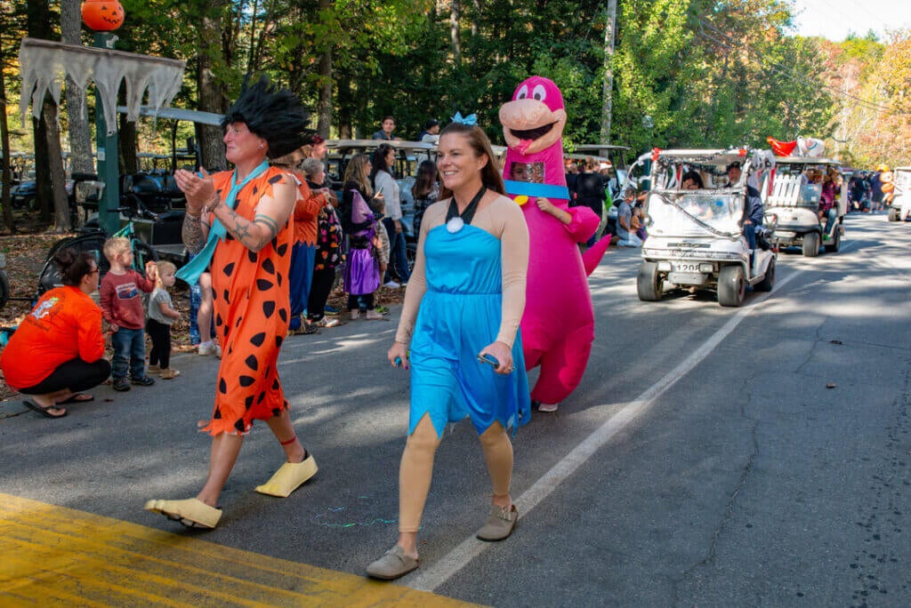 Guests dressed as the Flintstones in the Halloween Parade at Point Sebago Resort in Maine. Photo courtesy of Dave Rando Photography.