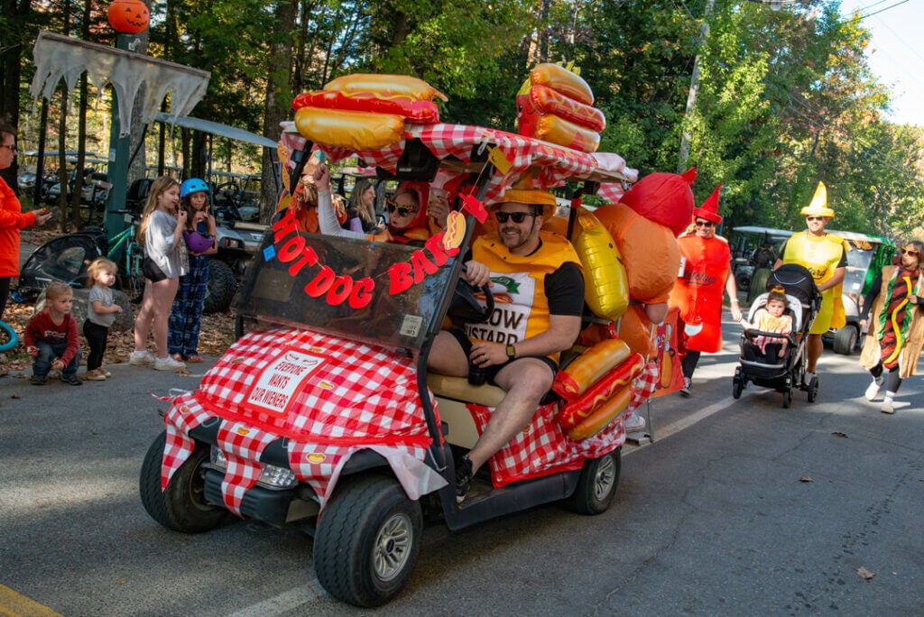 A hot dog themed golf cart in the Halloween Parade at Point Sebago Resort in Maine. Photo courtesy of Dave Rando Photography.