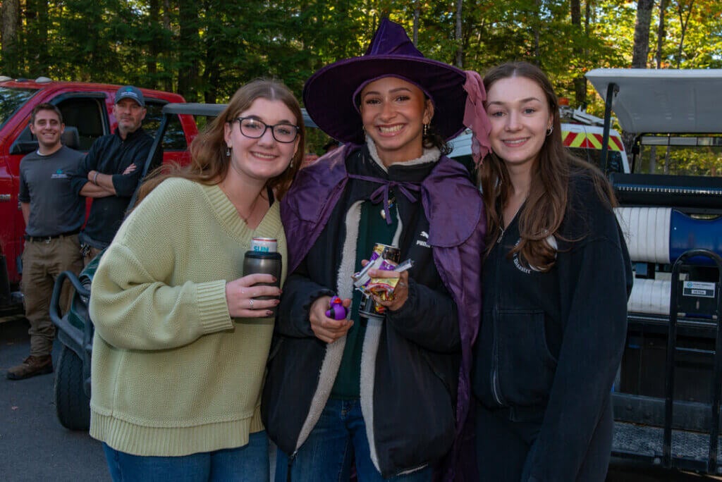 Guests collecting candy in the Halloween Parade at Point Sebago Resort in Maine. Photo courtesy of Dave Rando Photography.