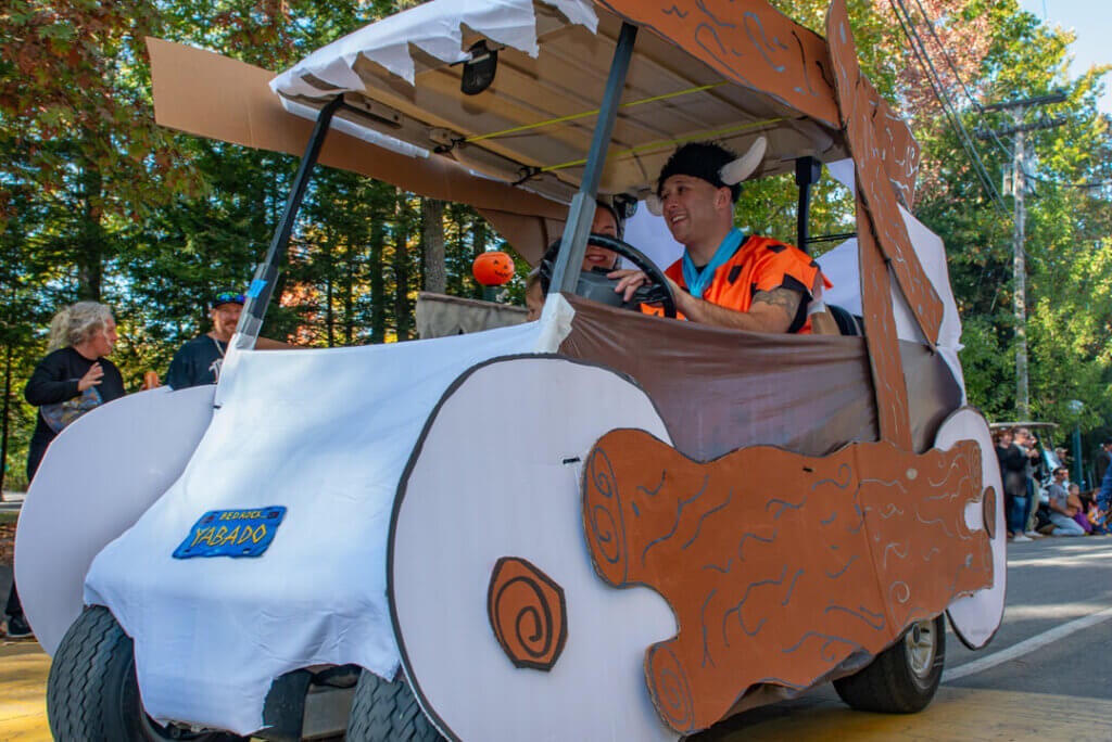 Flintstones themed golf cart in the Halloween Parade at Point Sebago Resort in Maine. Photo courtesy of Dave Rando Photography.