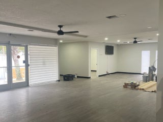 A main room within the West Clubhouse at Rolling Greens Village in Ocala, Florida.