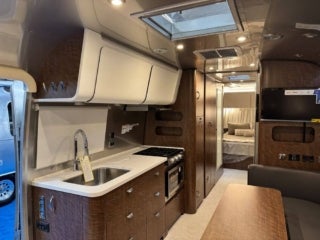Interior of an Airstream Globetrotter travel trailer at the 2026 Florida RV SuperShow in Tampa, FL.