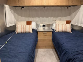 Interior of an Airstream Trade Wind travel trailer at the 2026 Florida RV SuperShow in Tampa, FL.