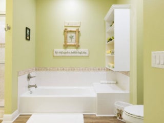 Bathroom within the vacation home guest rental in Leesburg, Florida, at Holiday RV Park.