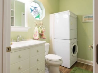 Bathroom within the vacation home guest rental in Leesburg, Florida, at Holiday RV Park.