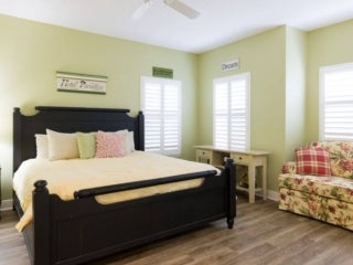 Bedroom within the vacation home guest rental in Leesburg, Florida, at Holiday RV Park.