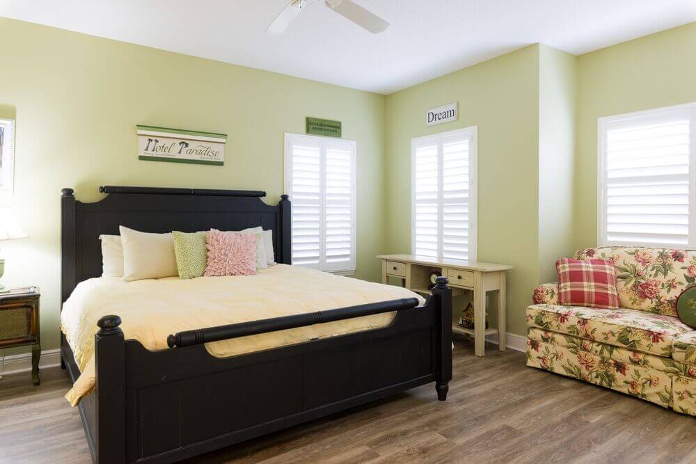 Bedroom within the vacation home guest rental in Leesburg, Florida, at Holiday RV Park.