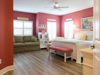 Bedroom within the vacation home guest rental in Leesburg, Florida, at Holiday RV Park.