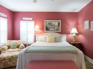 Bedroom within the vacation home guest rental in Leesburg, Florida, at Holiday RV Park.