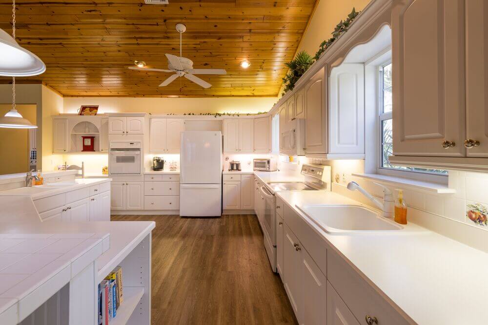 Kitchen within the vacation house rental in Leesburg, Florida, at Holiday RV Park.