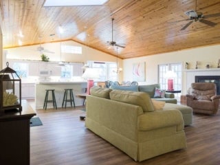 Living space within the vacation house rental in Leesburg, Florida, at Holiday RV Park.