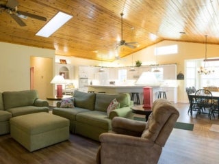 Living space within the vacation house rental in Leesburg, Florida, at Holiday RV Park.
