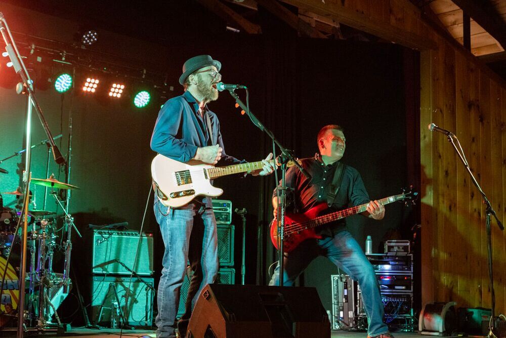 Members of the band Stolen Mojo playing at Point Sebago Resort in Maine.