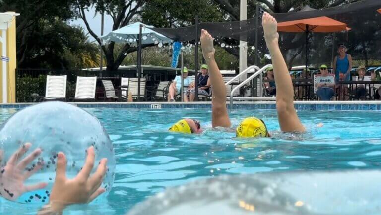Synchronized swimming event in Camelot Lakes Village in Sarasota, Florida