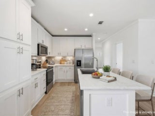 EBV - 20513 Polynesian Lp - Virtually Staged 01-4 Virtually staged interior of 20513 Polynesian Lp. at Estero Bay Village in Estero, Florida.