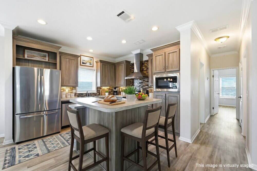 EBV-20548-Polynesian-Lp-Kitchen-STAGED-1-WM Virtually staged interior of 20548 Polynesian Lp. at Estero Bay Village in Estero, Florida.