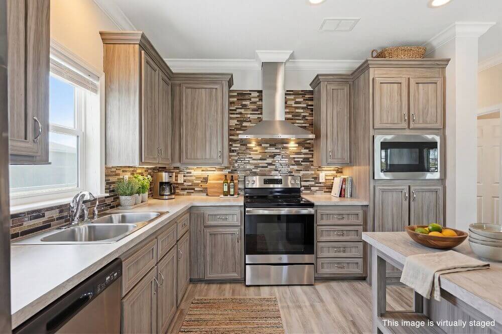 EBV-20548-Polynesian-Lp-Kitchen-STAGED-2-WM Virtually staged interior of 20548 Polynesian Lp. at Estero Bay Village in Estero, Florida.