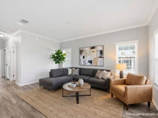 Virtually staged interior of 20548 Polynesian Lp. at Estero Bay Village in Estero, Florida.