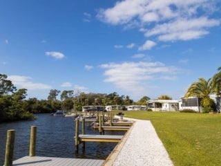 View of boat docks in the neighborhood at Estero Bay Village in Estero, Florida.