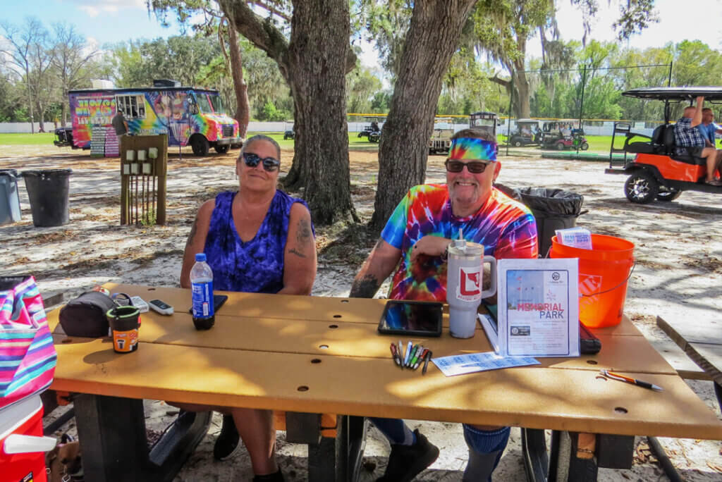 Guests working the 50/50 raffle fundraiser during Hippie Fest at 55+ Holiday RV Park in Leesburg, Fl.