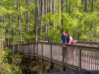 Couple on Bridge at Lake Jasper RV Park in Hardeeville, South Carolina