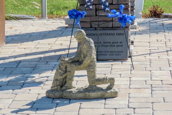 TMS Statue at Flag Pole Veterans Park Statue in The Meadows, a 55+ Tarpon Springs community.
