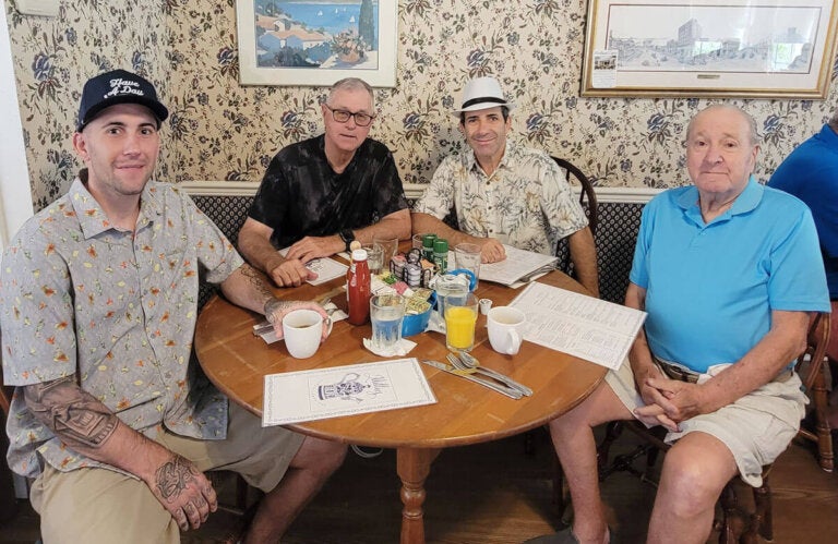 Residents at Camelot East Village in Sarasota, Florida out at a Father's Day Brunch