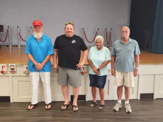 Camelot East staff and residents at a Veterans luncheon in Sarasota, Florida