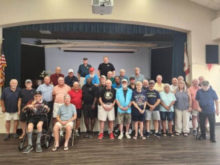 Camelot East staff and residents at a Veterans luncheon in Sarasota, Florida
