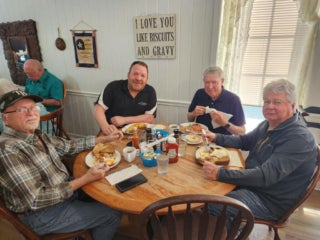 Camelot East staff and residents at a Veterans luncheon in Sarasota, Florida