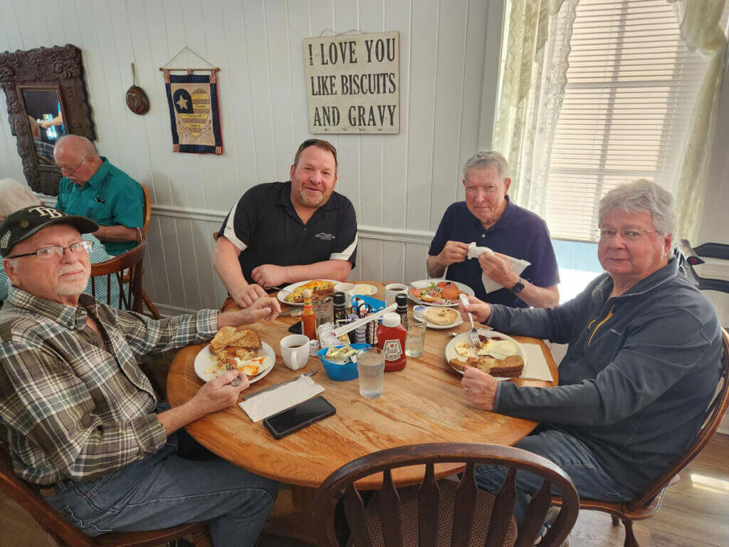 Camelot East staff and residents at a Veterans luncheon in Sarasota, Florida