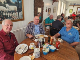 Camelot East staff and residents at a Veterans luncheon in Sarasota, Florida