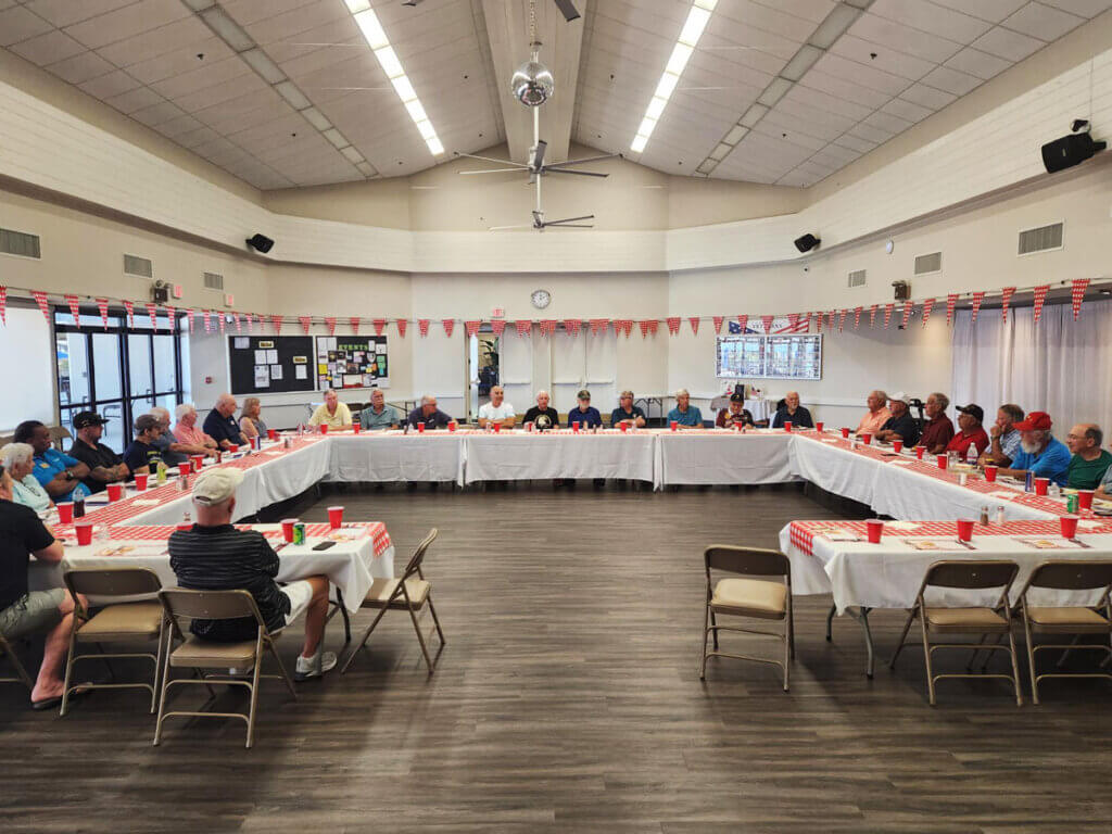 Camelot East staff and residents at a Veterans luncheon in Sarasota, Florida