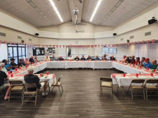 Camelot East staff and residents at a Veterans luncheon in Sarasota, Florida