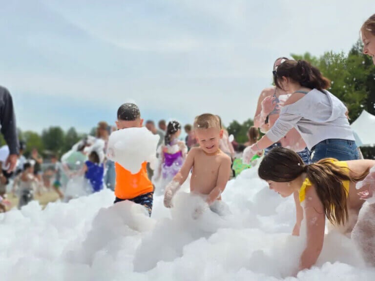 River (Mayor of Sebago) enjoying the foam beach party!