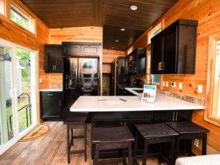 A kitchen inside of a lake cabin at Point Sebago Resort in Casco, Maine.